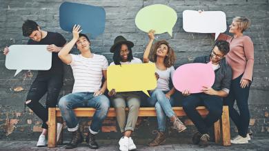 
		People with speech bubbles in their hands
	